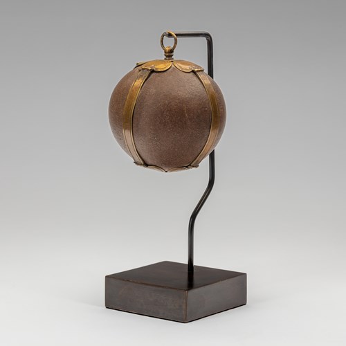A Bezoar Stone with Metal Mount